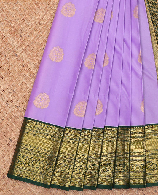 Lavender Budget Silk Saree, Mesmerized with Zari Buttas on Its Body, Complemented by a Contrast Traditional Zari Design Border, Grand Jaal Pallu, and Paired with a Contrast Blouse