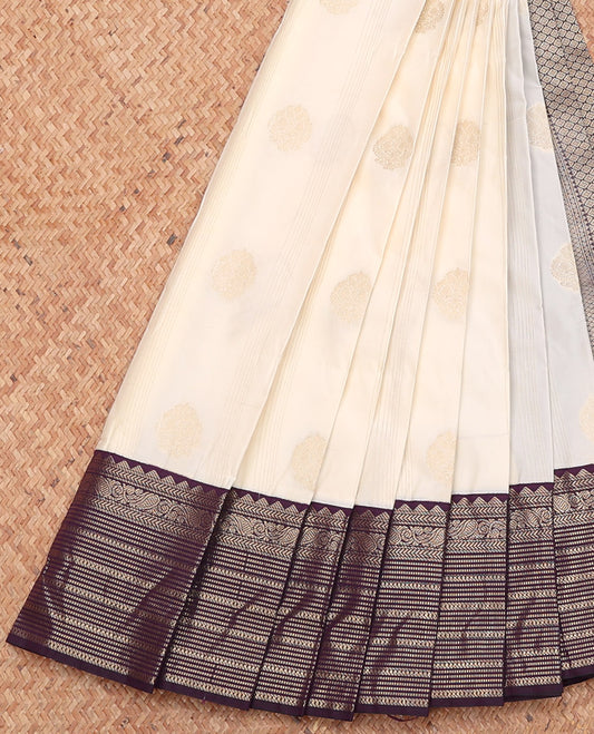 Off-White Budget Silk Saree, Enthralled with Zari Buttas, Complemented by a Contrast Traditional Zari Border, Grand Pallu, and a Contrast Blouse
