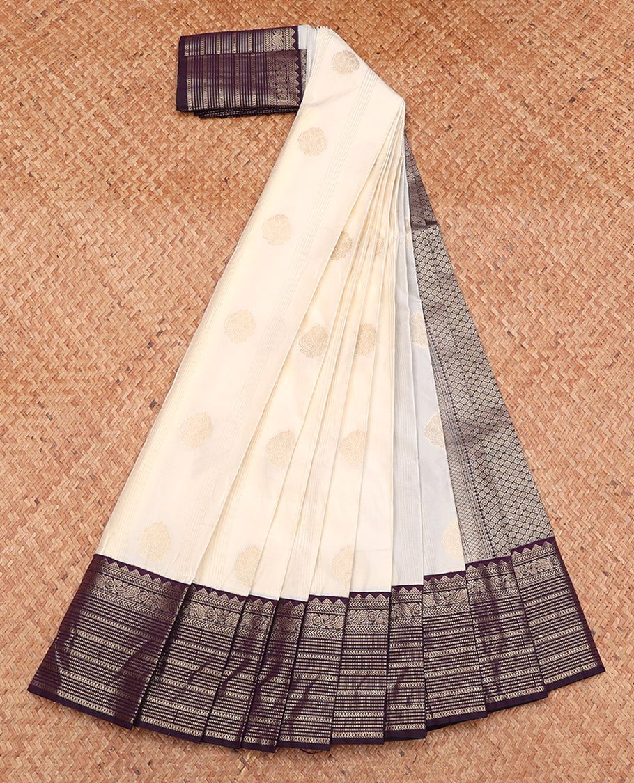 Off-White Budget Silk Saree, Enthralled with Zari Buttas, Complemented by a Contrast Traditional Zari Border, Grand Pallu, and a Contrast Blouse