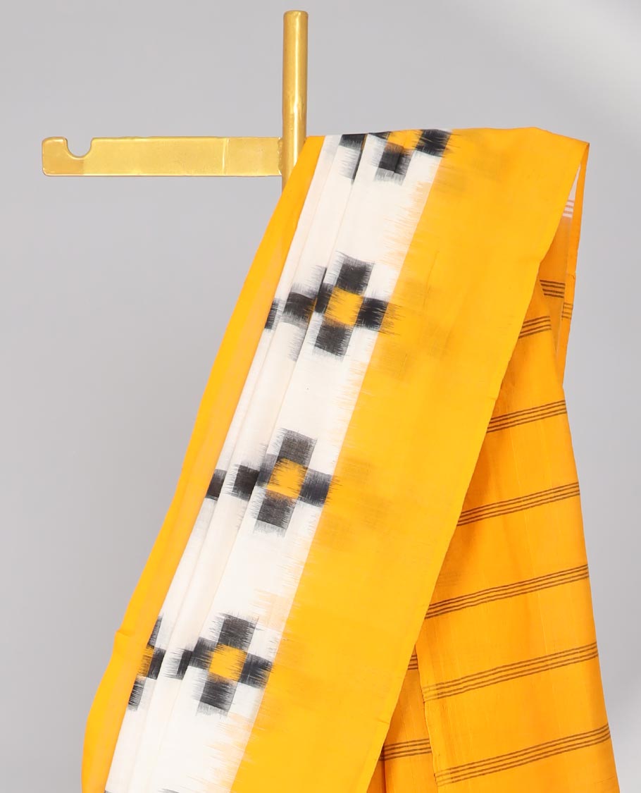 Cream Geomentric buttas ikkat cotton saree ,contrast plain border &striped pallu