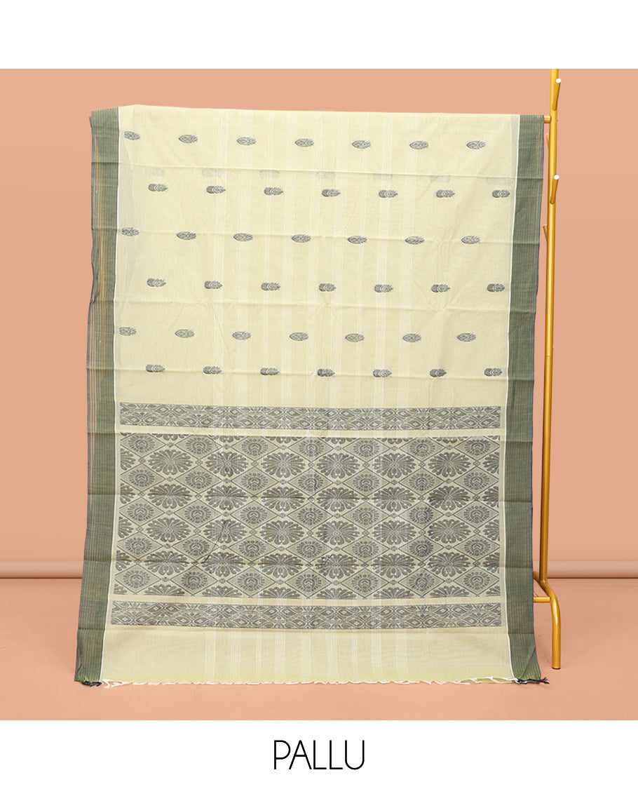 Green Kanchi Cotton Saree, Decked Up with Thread Buttas, Contrast Border, Pallu of Jaal Design, and a Matching Blouse
