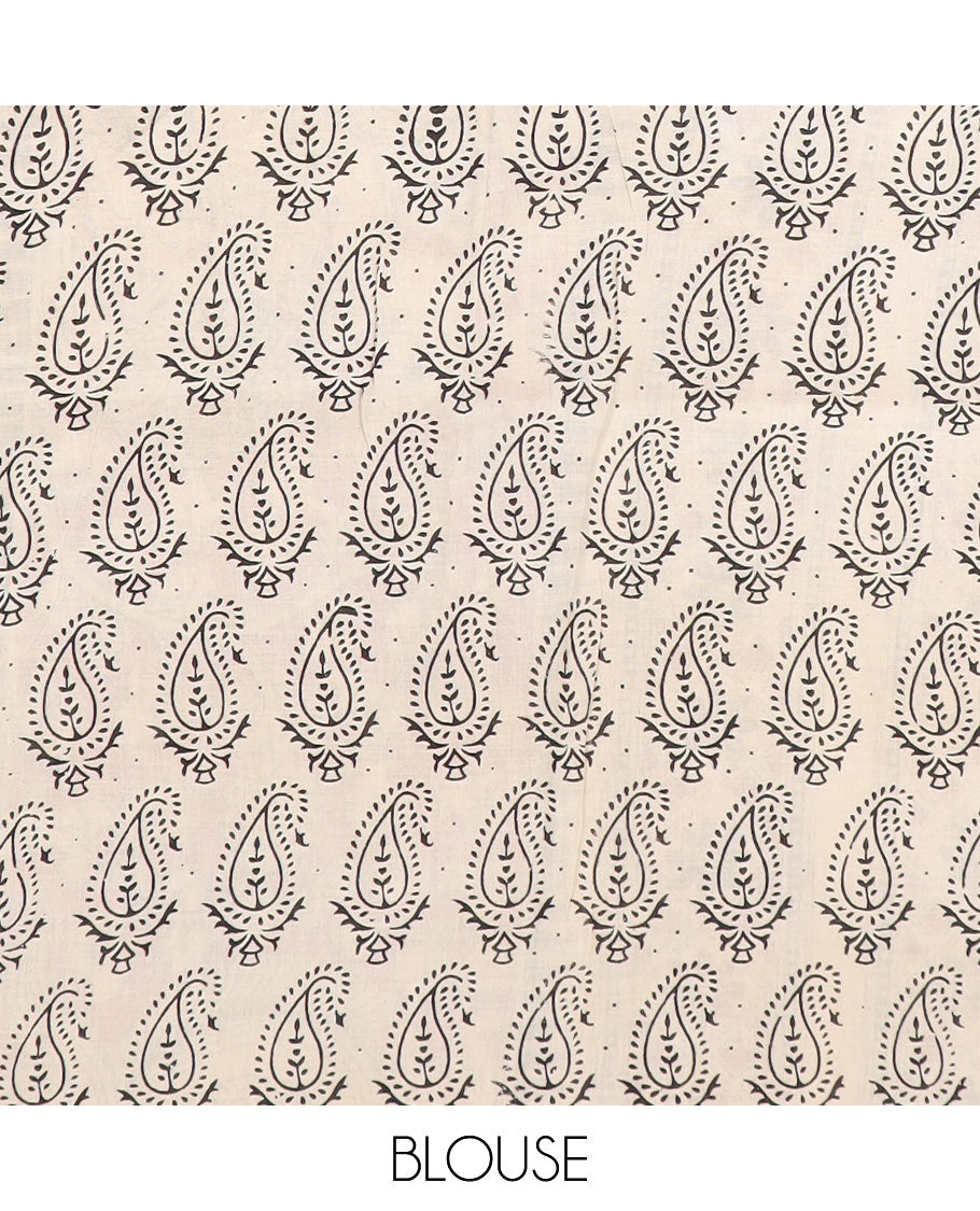 Blue floral vine and bird machine-printed Kalamkari cotton saree, contrast Pichwai cow border, and pallu of floral-peacock designs