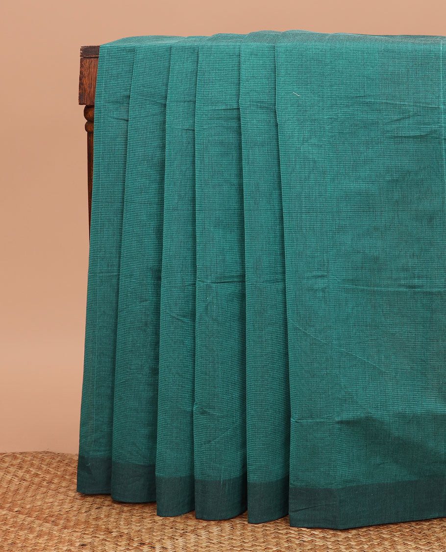 Green striped chirala cotton saree, plain border, and contrast floral vine printed blouse