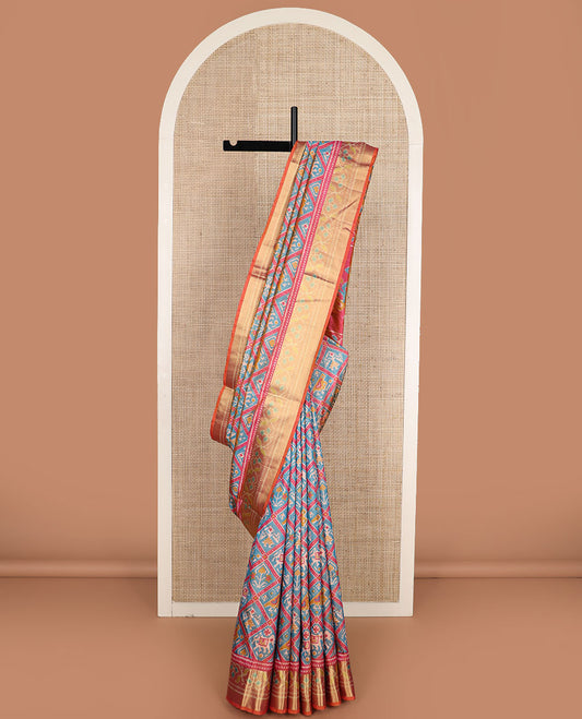 Blue unique motifs enclosed jaal design patola silk saree, contrast zari border, and pallu of paisley designs