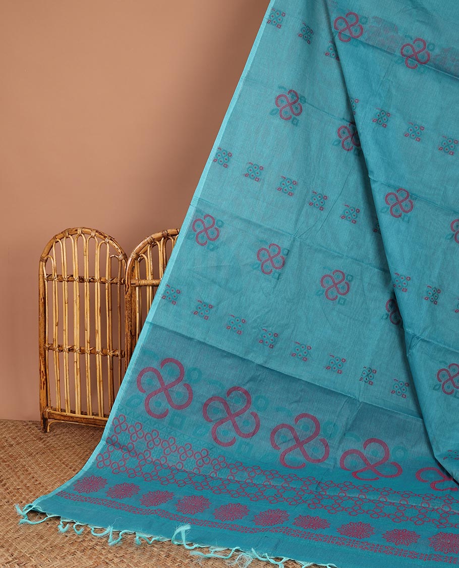 Borderless blue Coimbatore cotton saree with buttas, self-pallu of intricate designs
