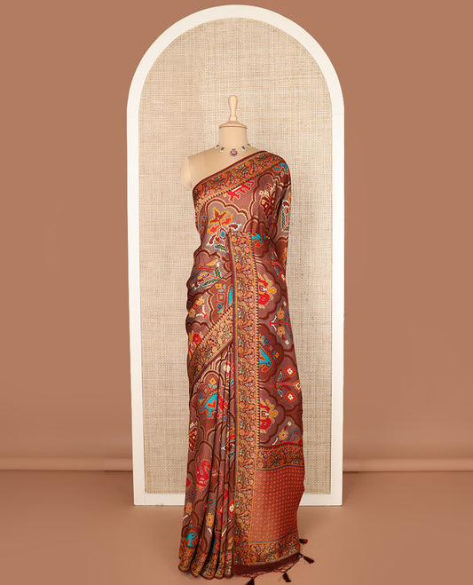 Brown ikkat design printed dola silk saree, floral vine, and peacock border, and jaal pallu