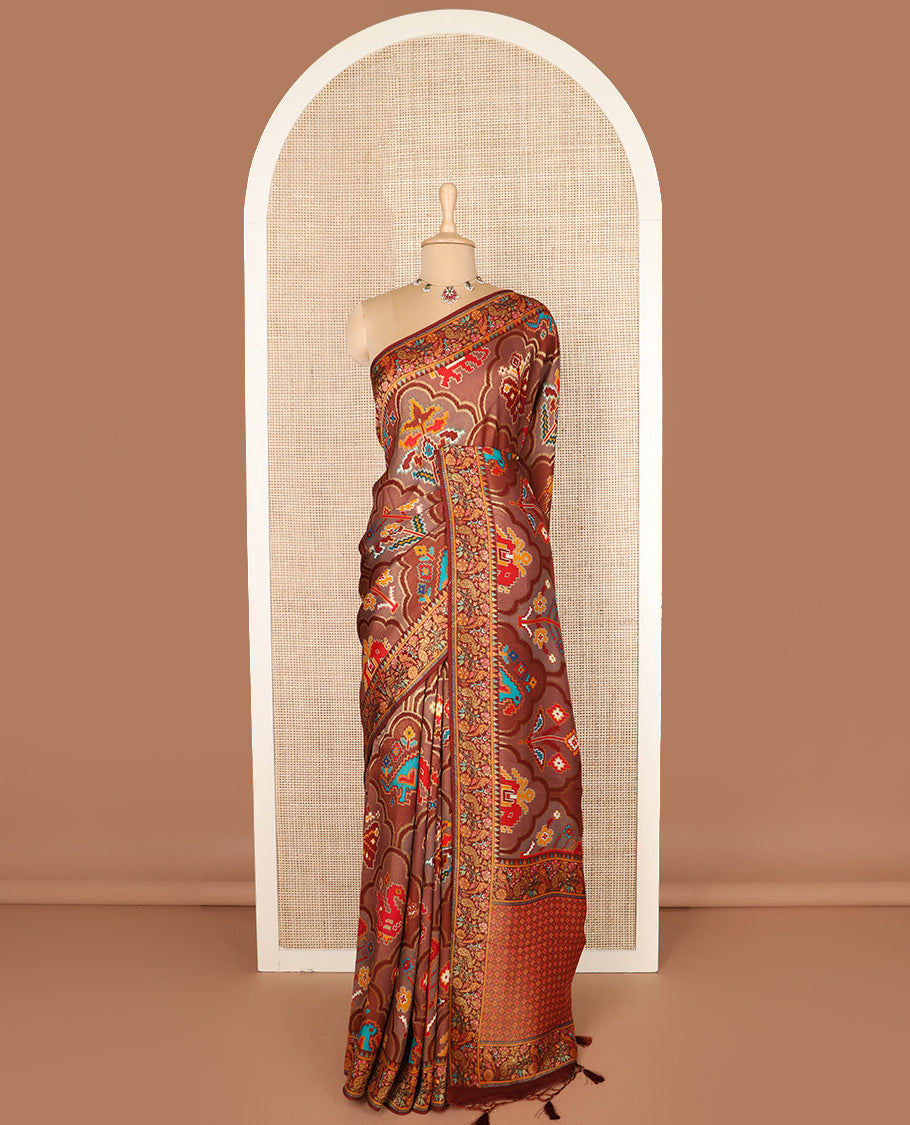 Brown ikkat design printed dola silk saree, floral vine, and peacock border, and jaal pallu