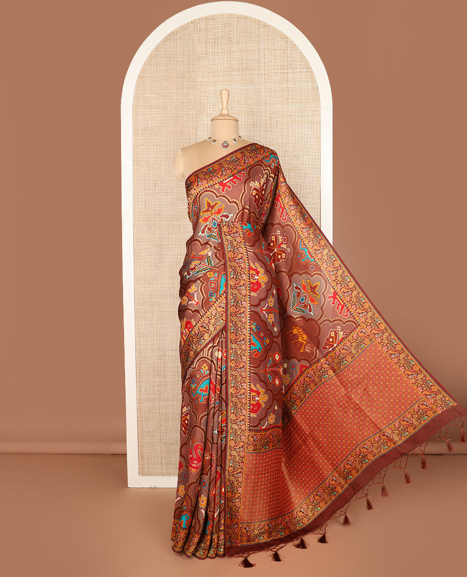 Brown ikkat design printed dola silk saree, floral vine, and peacock border, and jaal pallu