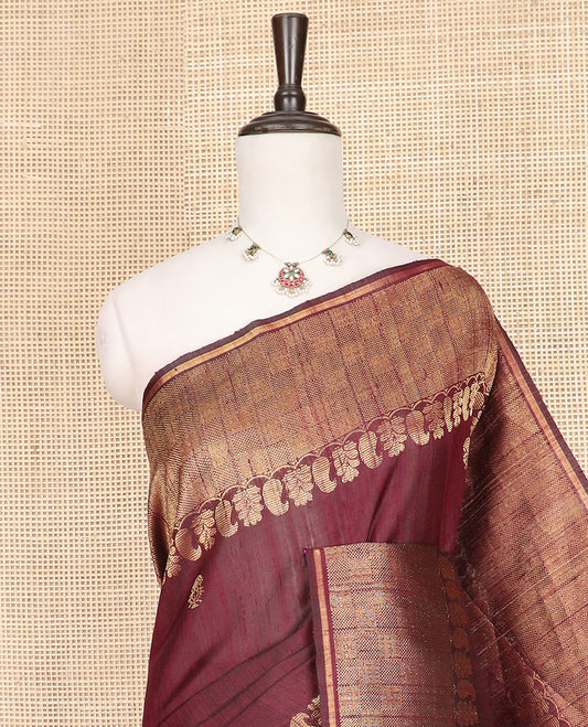 Maroon Dupion Silk Saree Subtly Sparkled with Buttas All Over Its Body, Adorned with Self-Border of Paisley and Checked Designs, Zari Elevated Pallu, and Paired with a Matching Blouse