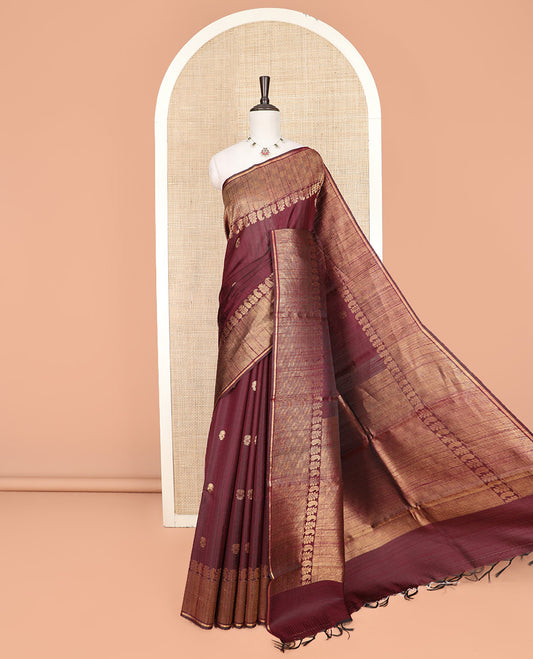 Maroon Dupion Silk Saree Subtly Sparkled with Buttas All Over Its Body, Adorned with Self-Border of Paisley and Checked Designs, Zari Elevated Pallu, and Paired with a Matching Blouse