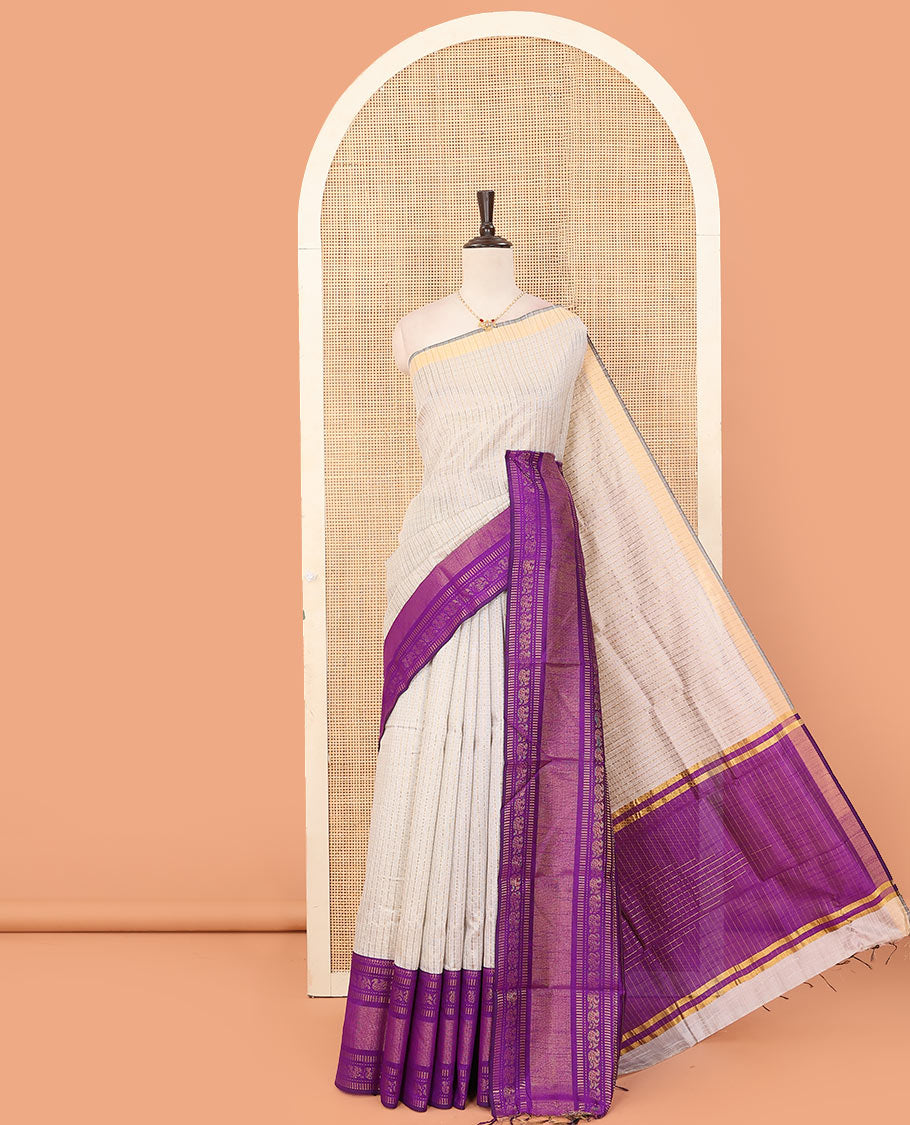 Light sandal butta enclosed checked dupion saree, contrast traditional zari border, and zari design pallu