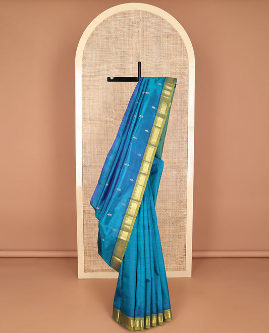 Blue floral buttas kancheepuram silk saree with contrast border of thilakam mokku, kayil kann design & striped, floral design pallu