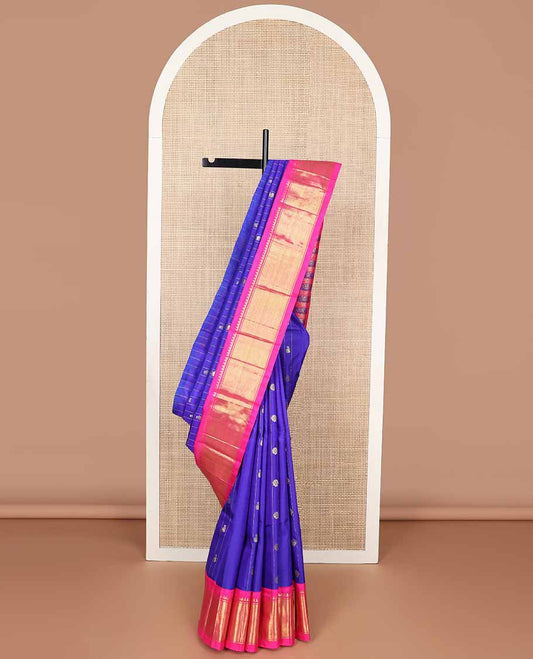 Blue striped, buttas kancheepuram silk saree with contrast korvai border of intricate zari design & floral design pallu