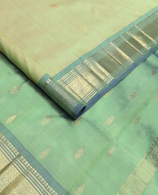 Green zari buttas kanchipuram silk saree, contrast one-sided korvai border of panner sombu,banaras,muthu & jaal & zari design pallu