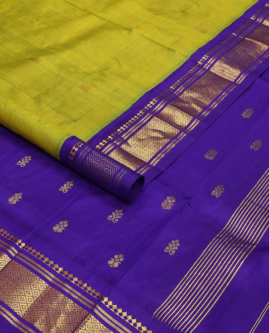 Green kancheepuram silk saree with zari buttas, contrast one-sided korvai border of panner sombu, banaras & mayil kann design & pallu of zari designs