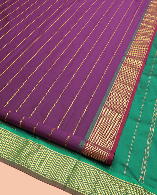 Purple Plain Ten-Yard Art Silk Saree Elevated with Neli Stripes, Complemented by a Contrast Traditional Ara Maadam Border, and Pallu Featuring Traditional Ara Maadam and Zari Designs