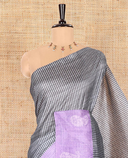 Grey and Lavender Semi-Tussar Saree Adorned with Vertical Stripes Printed Across the Body, Featuring a Contrast Paisley Motif Printed Border, an Intricately Designed Pallu of Jaal Design, and Paired with a Contrast Blouse