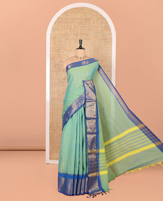 Blue-Green Double-Shade Plain Chettinad Cotton Saree, Complemented by Contrast Border Steeped with Traditional Zari Designs, Subtly Striped Pallu, and Paired with a Matching Blouse