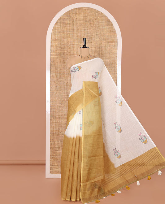 Borderless Cream and Mustard Linen Cotton Saree, Bedecked with Half-and-Half Style Fish Motifs Printed All Over Its Body, Pallu Mirrors the Same Print, and Is Paired with a Contrast Blouse