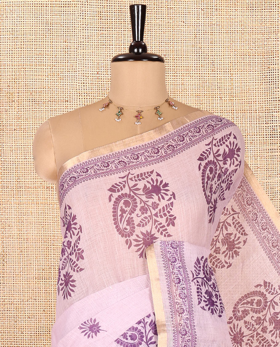 Pink Linen Cotton Saree, Beautiful Designed with Floral-Paisley Motifs Print All Over Its Body, Highlighted by Gold Zari Printed Border, Floral-Paisley Printed Pallu and Paired with a Matching Blouse