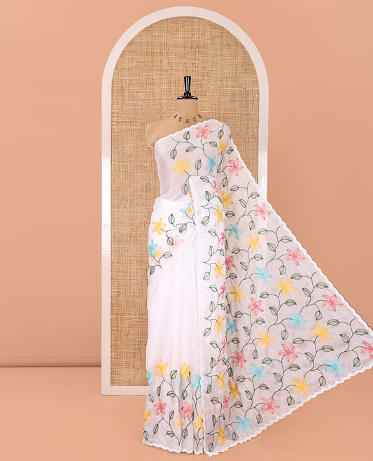 White Rangoli Chiffon Saree, Adorned with Multi-Color Floral Vine Embroidery on Its Body, Floral Embroidered Pallu, and Contrast Floral Embroidered Blouse