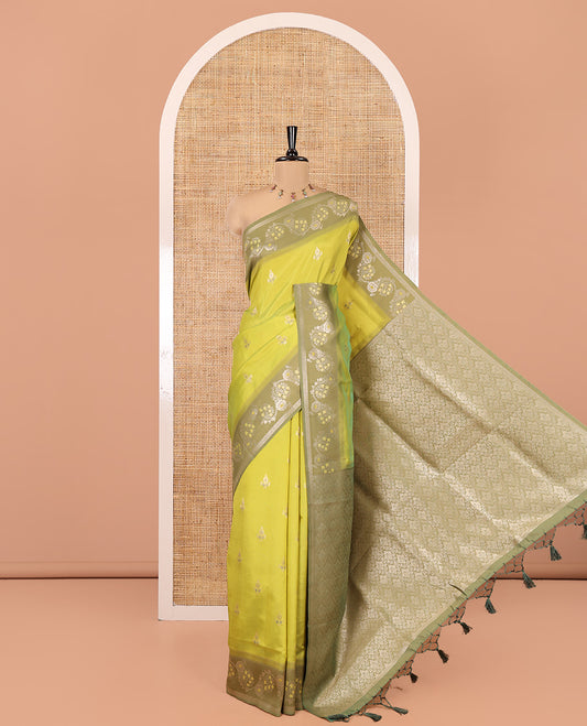 Green Elite Soft Silk Saree, Beautified with Zari Buttas, Complemented by Contrast Meenakari Floral Creeper Border, Intricate Pallu, and a Contrast Blouse