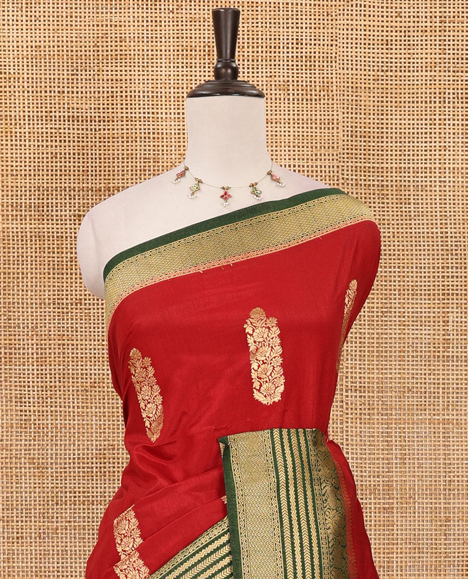 Maroon floral zari buttas dola silk saree, contrast traditional zari peacock border, diagonal floral zari striped pallu & contrast jacquard blouse