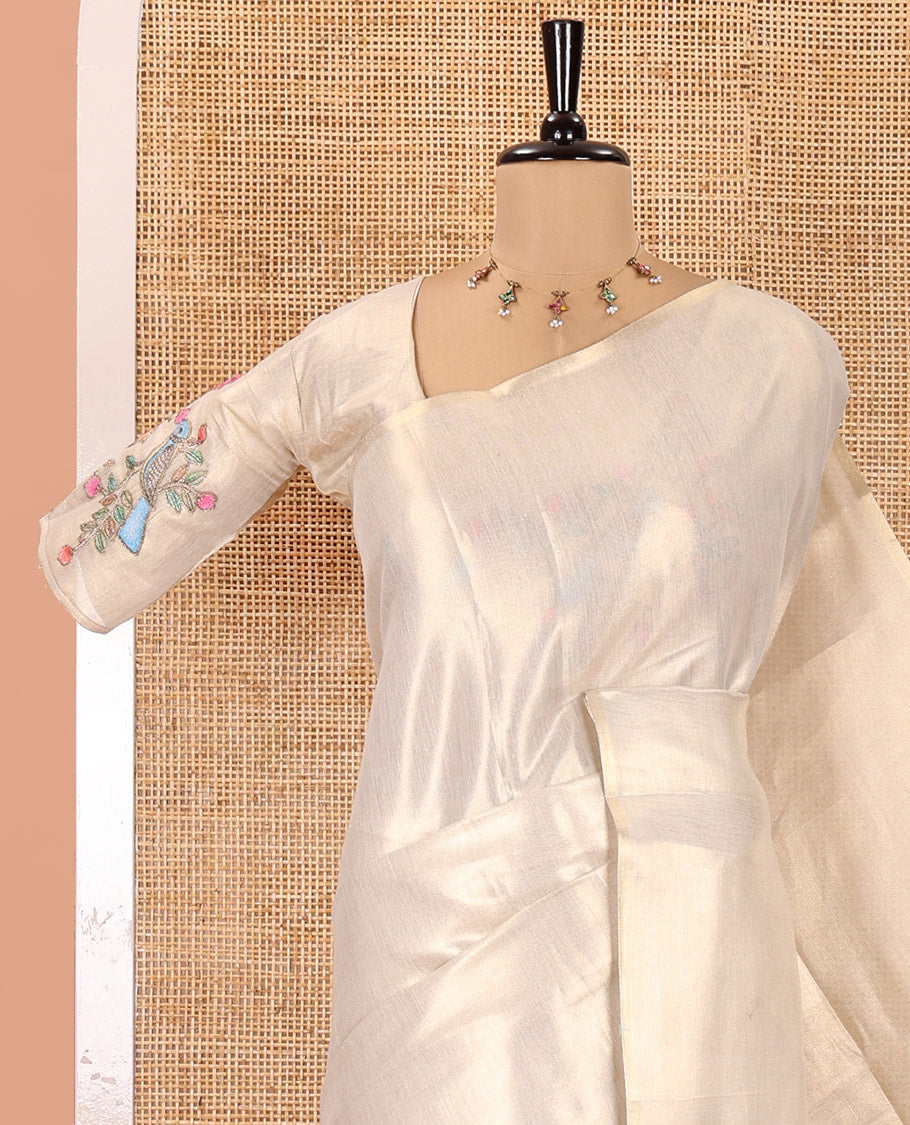 Borderless Off-White Tissue Saree, Enthralled with Colorful Floral-Bird Motif Printed with Outline Embroidery on Its Body, and Paired with a Readymade Elbow-Sleeve Round-Neck Blouse