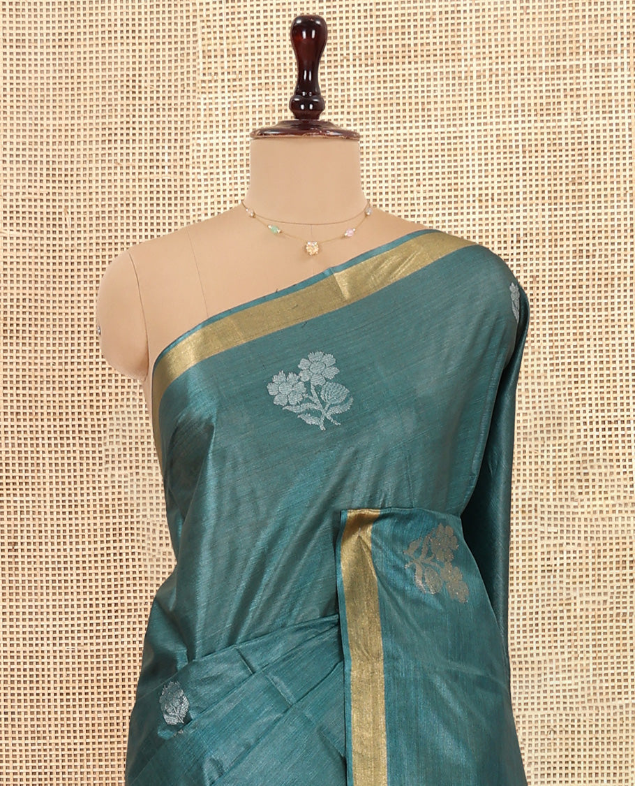 Green Tussar Saree, Showcasing Floral Buttas, a Subtle Zari Border, Pallu of Polka Dot and Floral Designs, and a Matching Blouse