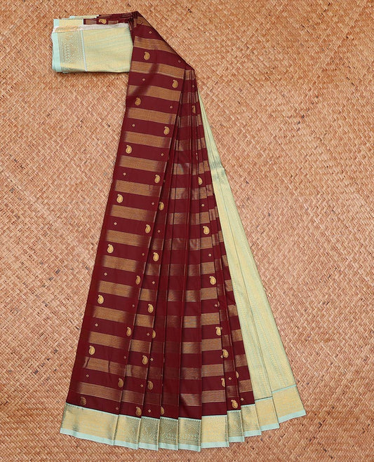Maroon zari striped and paisley motifs gift saree, contrast traditional zari design border, and geometric patterned pallu