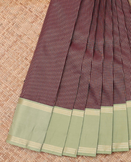 Maroon Budget Silk Saree, Embellished with Zari Stripes, a Contrast Rettai Pettu Border, Striped Pallu, and a Contrast Blouse