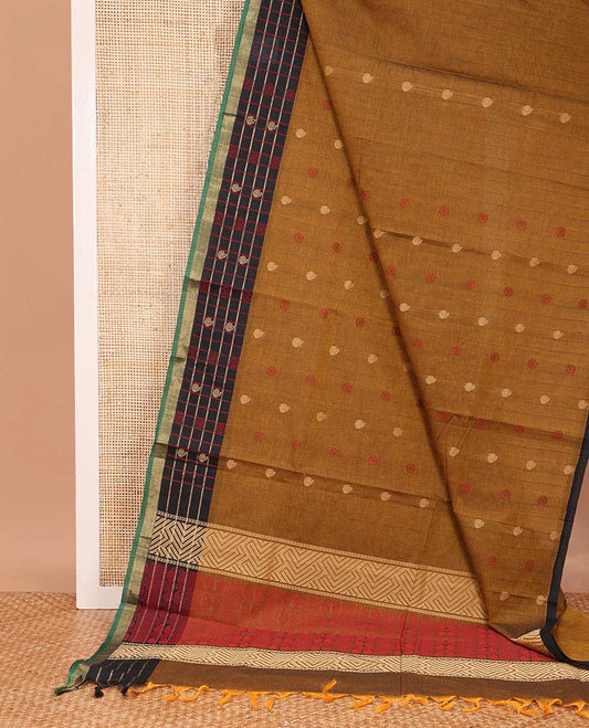 Mustard chakra, and paisley buttas Coimbatore cotton saree, contrast butta enclosed checked border, and pallu of paisleys and chevron design