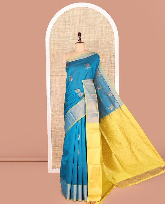 Blue Kuppadam Cotton Saree, Beautified with Zari Buttas on Its Body, Highlighted  by Bavanji Zari Border, Complemented by Contrast Ogee Patterned Pallu, and Paired with a Contrast Blouse