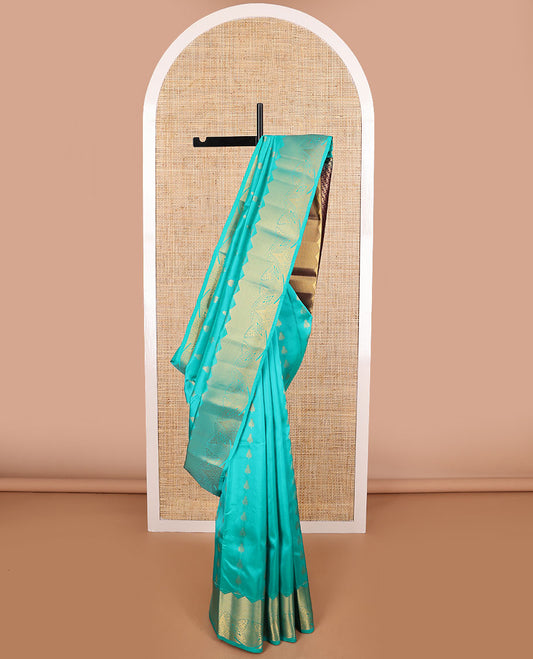 Light blue buttas vasundhara elite silk saree with self zari design border & geometric design pallu