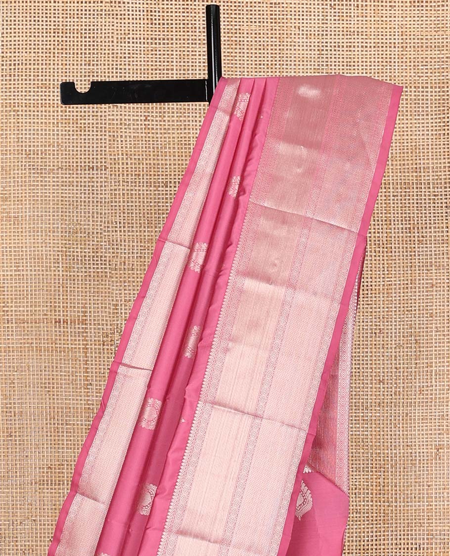 Pink zari buttas Vasundhara silk mix saree, zari border of thilakam mokku, muthu, ogee, and mayil kann, and neli striped pallu
