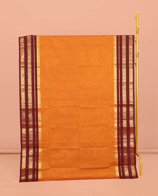 Orange Plain Chettinad Cotton Saree, Contrast Temple Varisai Pettu Floral Creeper Border, Striped Pallu, and a Matching Blouse