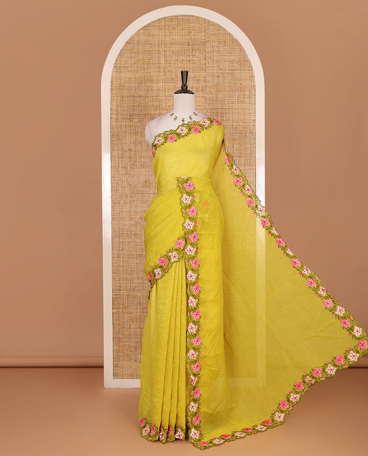 Parrot green full-plain crunchy crushed saree, scallop floral creeper thread embroidered border, and floral embroidered matching blouse