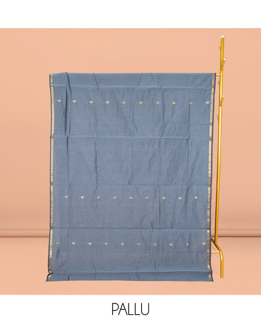 Grey Maheshwari Cotton Saree, Woven with Buttas All Over Its Body, Subtle Zari Piping Border, Complemented by a Contrast Pallu Steeped with Buttas, and Paired with a Contrast Blouse