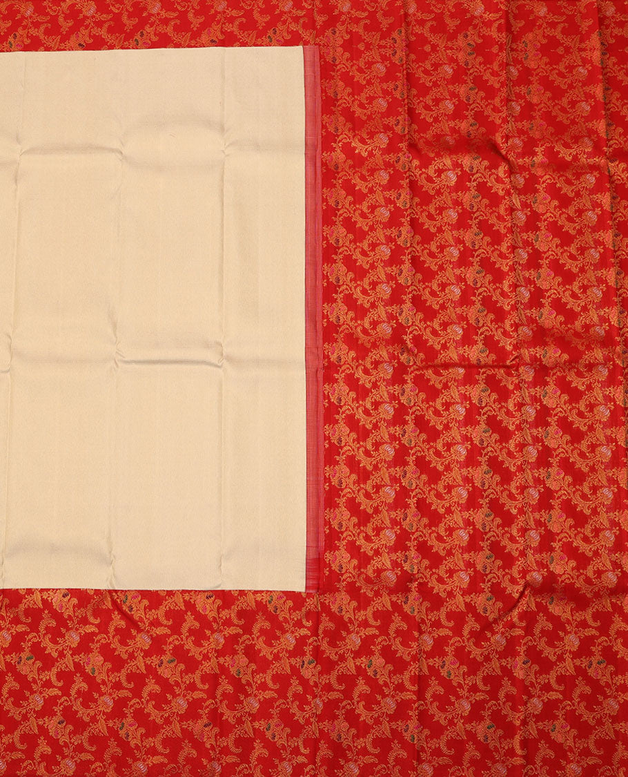 Cream embossed silk saree, contrast red border & pallu features meenakari resham thread woven floral jaal design