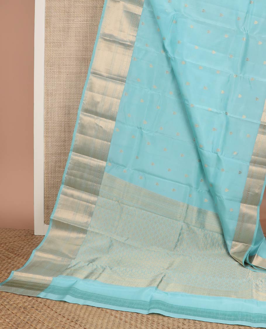 Blue zari buttas silk saree, jaal pallu & zari border of rekku, muthu, mayil kann & jadai nagam
