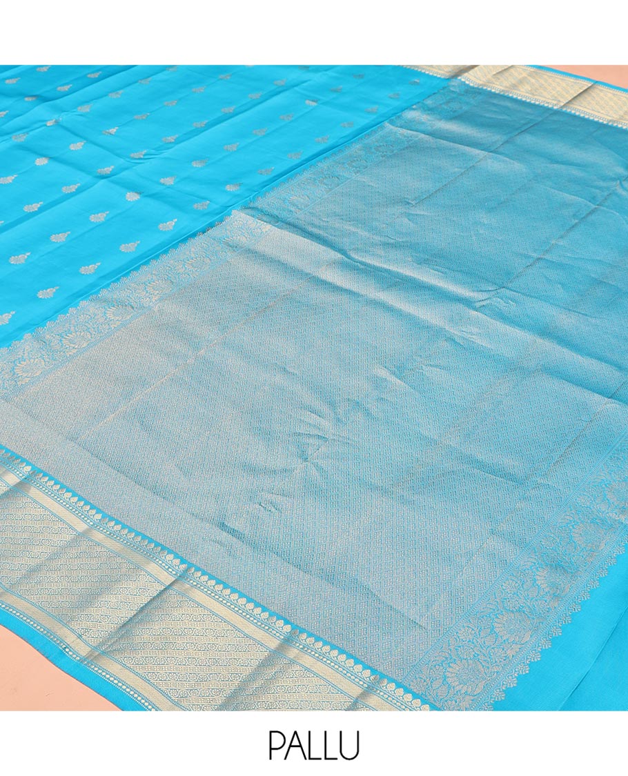 Blue Vasundhara Lite Silk Mix Saree, Adorned with Zari Buttas All Over Its Body, Highlighted by Zari Border of Thilakam Mokku, and Kodi Visiry Designs, Grand Jaal Pallu, and Paired with a Matching Blouse