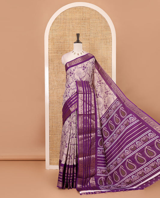 Purple floral printed dola silk saree,  contrast traditional zari rettai pettu border, pallu of paisley-floral print & contrast blouse of print & zari border