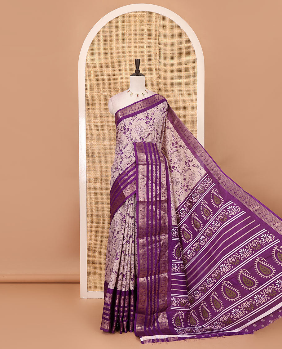 Purple floral printed dola silk saree,  contrast traditional zari rettai pettu border, pallu of paisley-floral print & contrast blouse of print & zari border