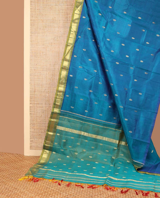 Blue floral buttas kancheepuram silk saree with contrast border of thilakam mokku, kayil kann design & striped, floral design pallu