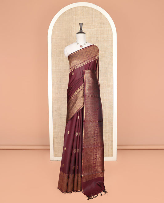 Maroon Dupion Silk Saree Subtly Sparkled with Buttas All Over Its Body, Adorned with Self-Border of Paisley and Checked Designs, Zari Elevated Pallu, and Paired with a Matching Blouse