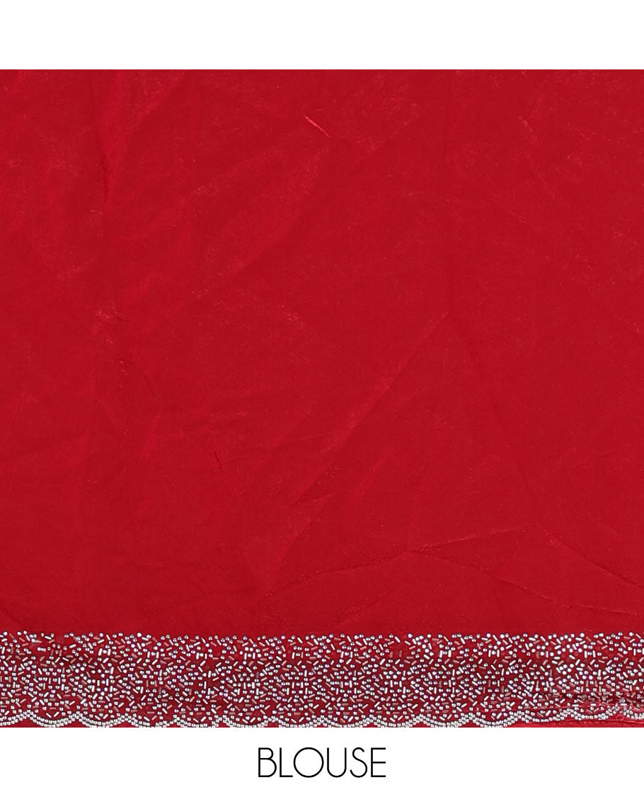 Maroon Swarovski crystal stone embedded fendy chiffon saree, scallop Swarovski stone embroidered border, and contrast plain blouse