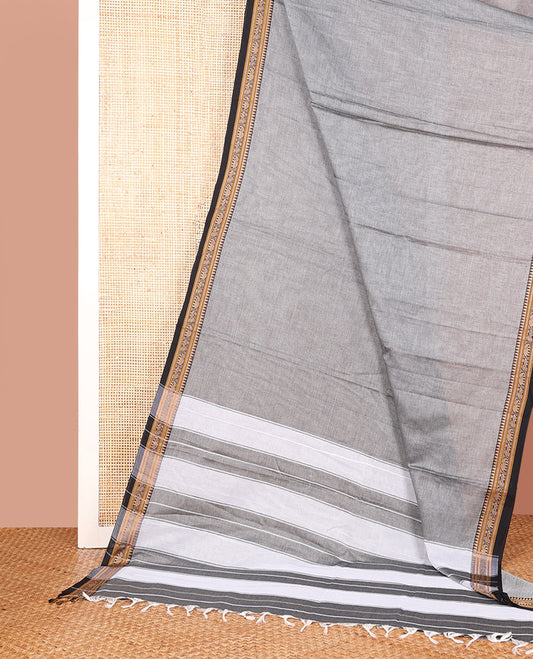 Grey Plain Narayanpet Cotton Saree, Complemented by a Contrast Traditional Thread Border of Peacock and Elephant Designs, Vibrantly Striped Pallu, and Paired with a Matching Blouse