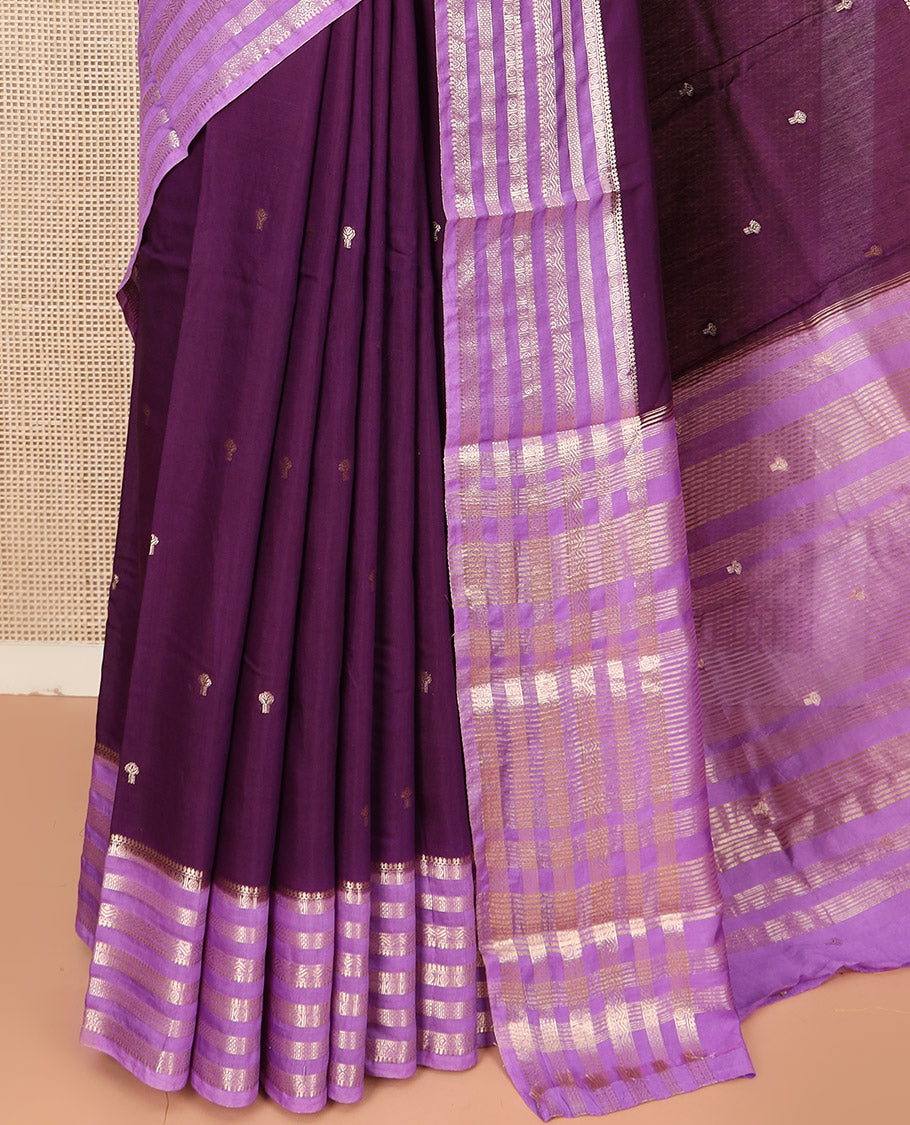 Purple Assam Silk Saree Adorned with Zari Buttas, complemented by Contrast Zari Border Featuring Traditional Zari Designs, a Gleaming Pallu of Zari Stripes, and Paired with a Contrast Blouse