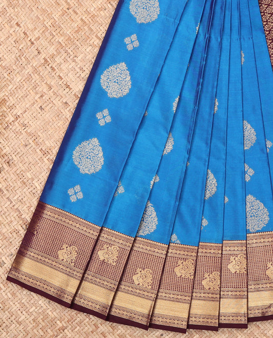 Blue Budget Silk Saree, Detailed with Zari Buttas, Complemented by a Contrast Traditional Zari Border, Grand Pallu, and a Contrast Blouse