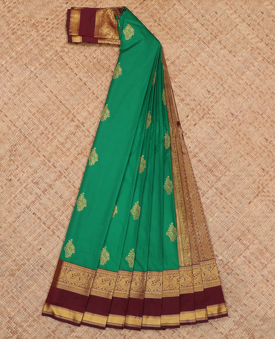 Green Budget Silk Saree, Detailed with Zari Buttas, Complemented by Contrast Traditional Rettai Pettu Border, a Jaal Pallu and a Contrast Blouse